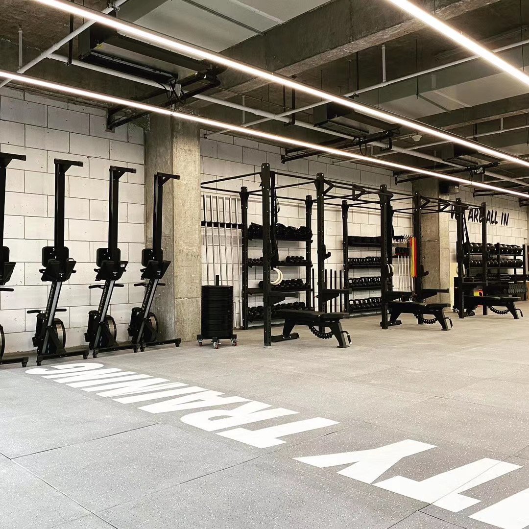 rubber flooring project in Italy training gym with light grey rolls