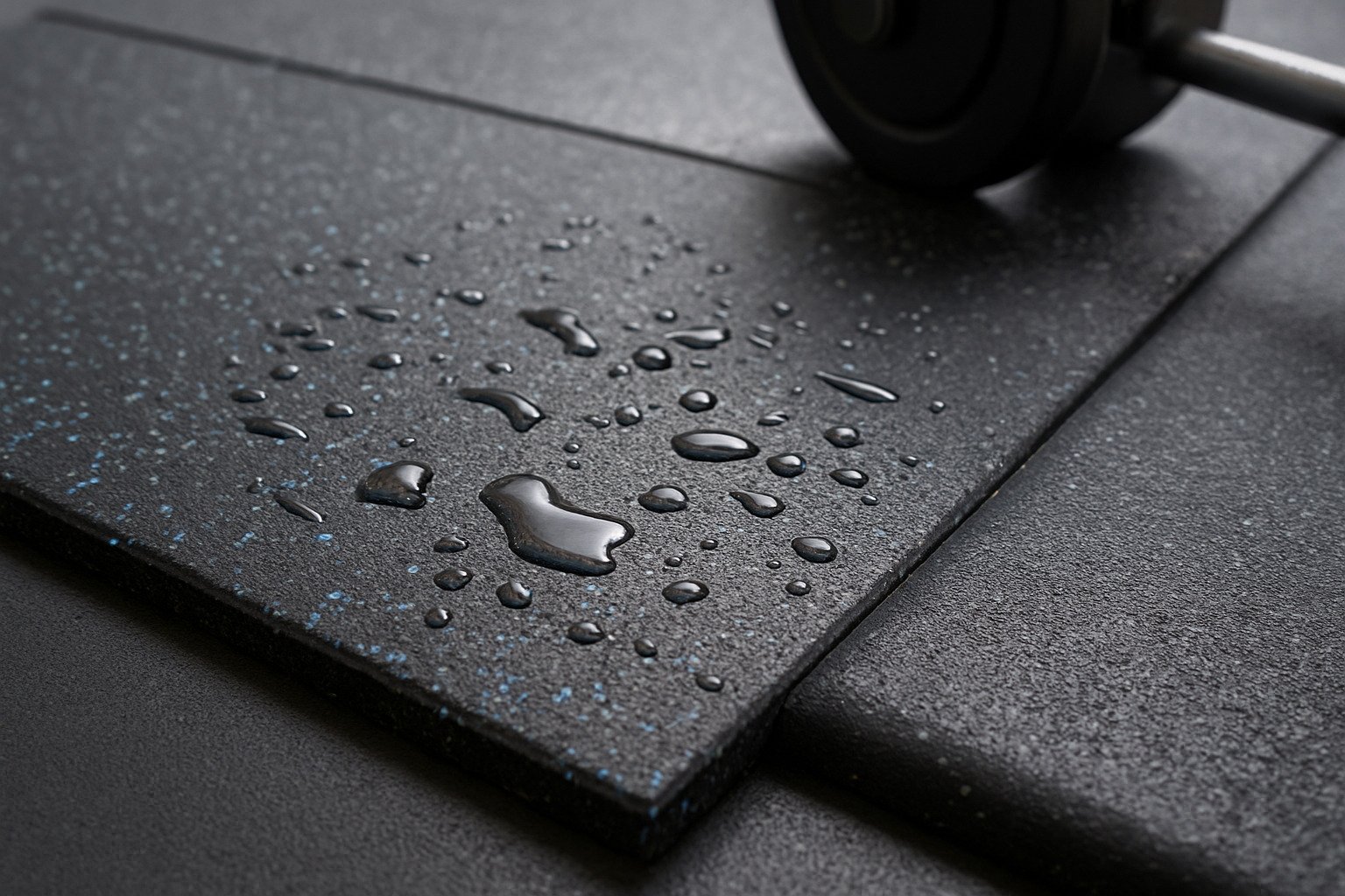 Rubber flooring with water droplets showing anti-slip surface