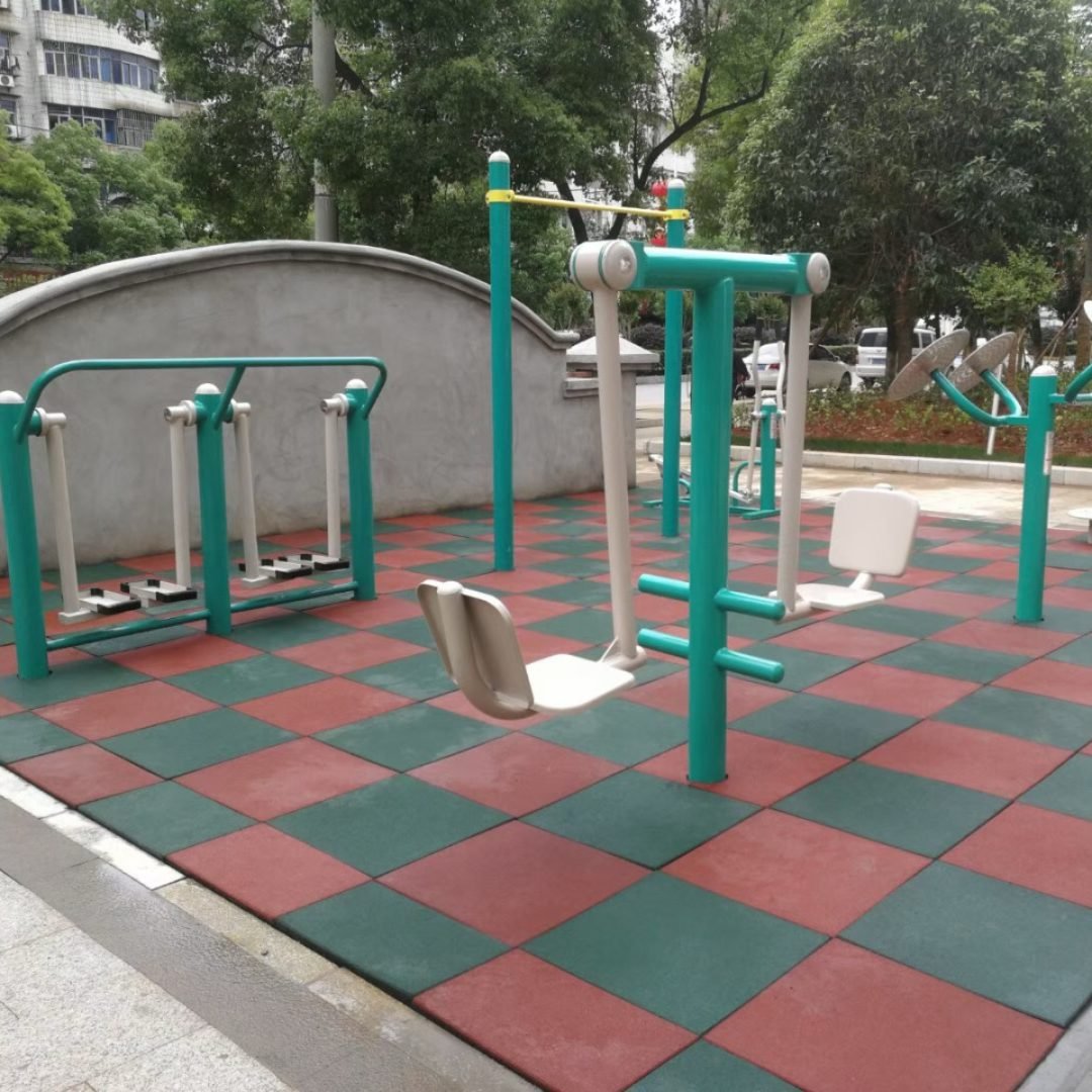outside rubber tile Outdoor rubber tiles installed in fitness park walkway zone